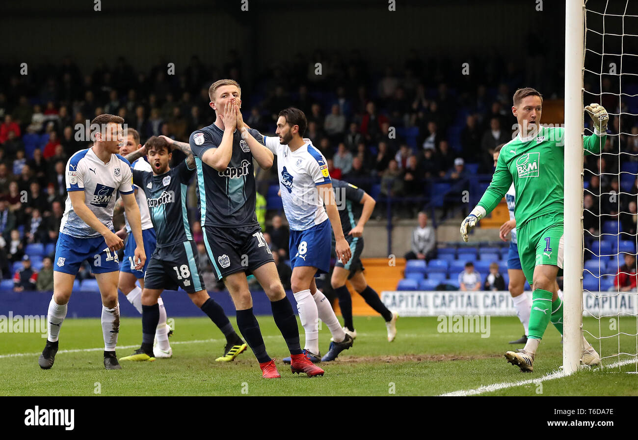 Bury's Scott Wharton reacts to a missed shot on goal during the Sky Bet League Two match at Prenton Park, Tranmere. Stock Photo