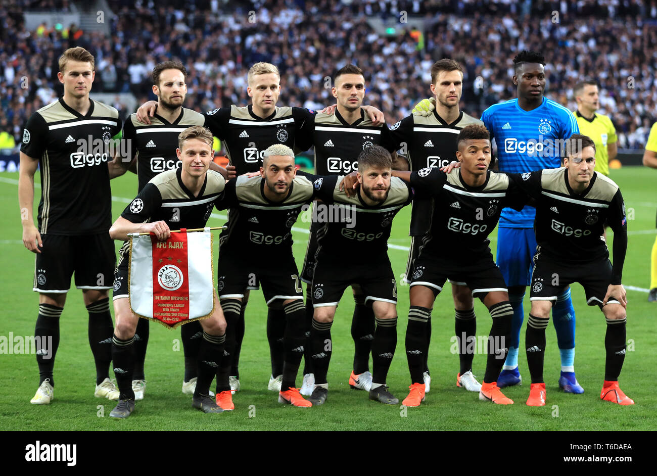 Ajax players pose for a photo ahead of the match, back row (left to right) Matthijs de Ligt, Daley Blind, Donny van de Beek, Dusan Tadic, Joel Veltman and Andre Onana (front row) Frenkie de Jong, Hakim Ziyech, Lasse Schone, David Neres and Nicolas Tagliafico during the Champions League, Semi Final, First Leg at the Tottenham Hotspur Stadium, London. Stock Photo