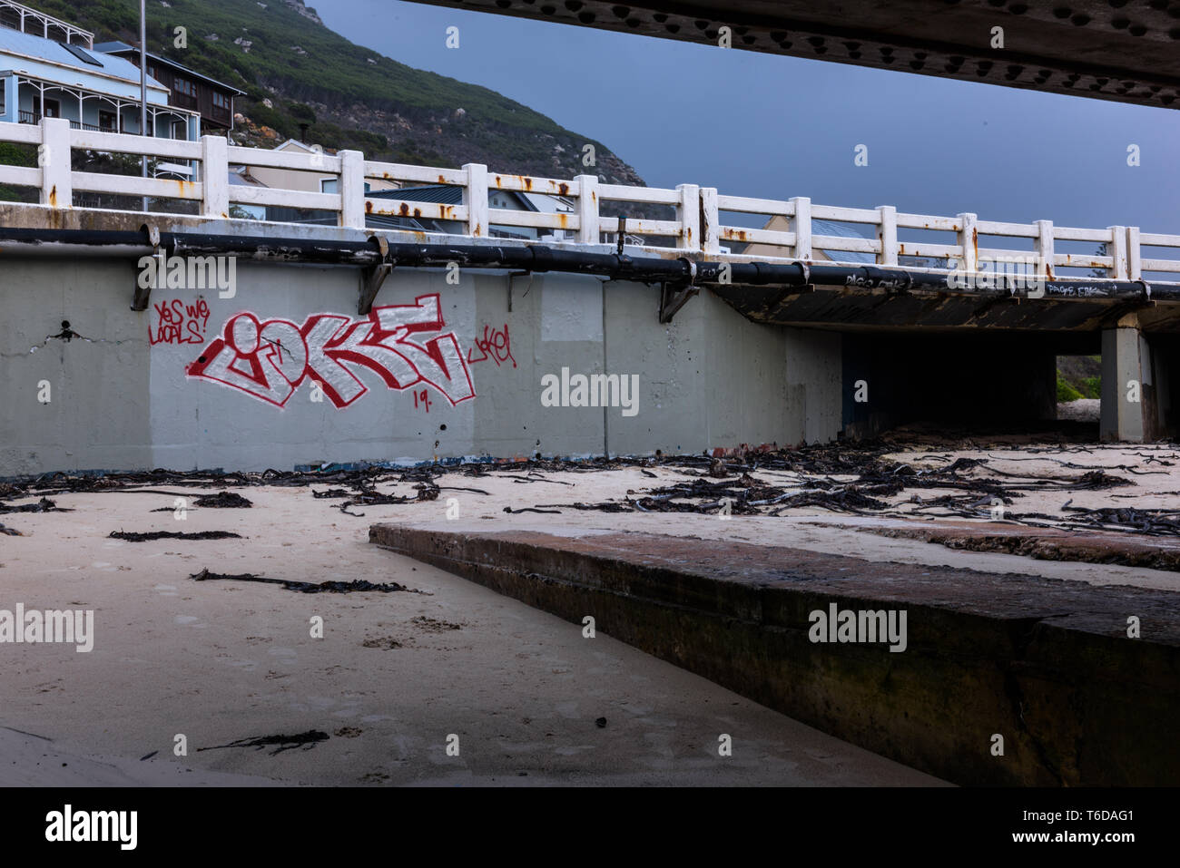 The main coastal road in Glencairn from beneath the railway bridge near