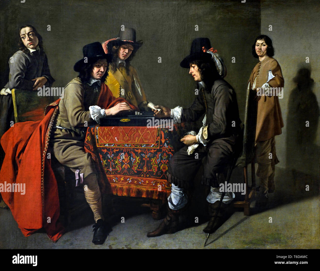 Trictrac players 1650 by MASTER of GAMES.  Painter working in Paris 17th century, in the entourage of Le Nain. French or Nordic painter working in Paris around 1650. Stock Photo