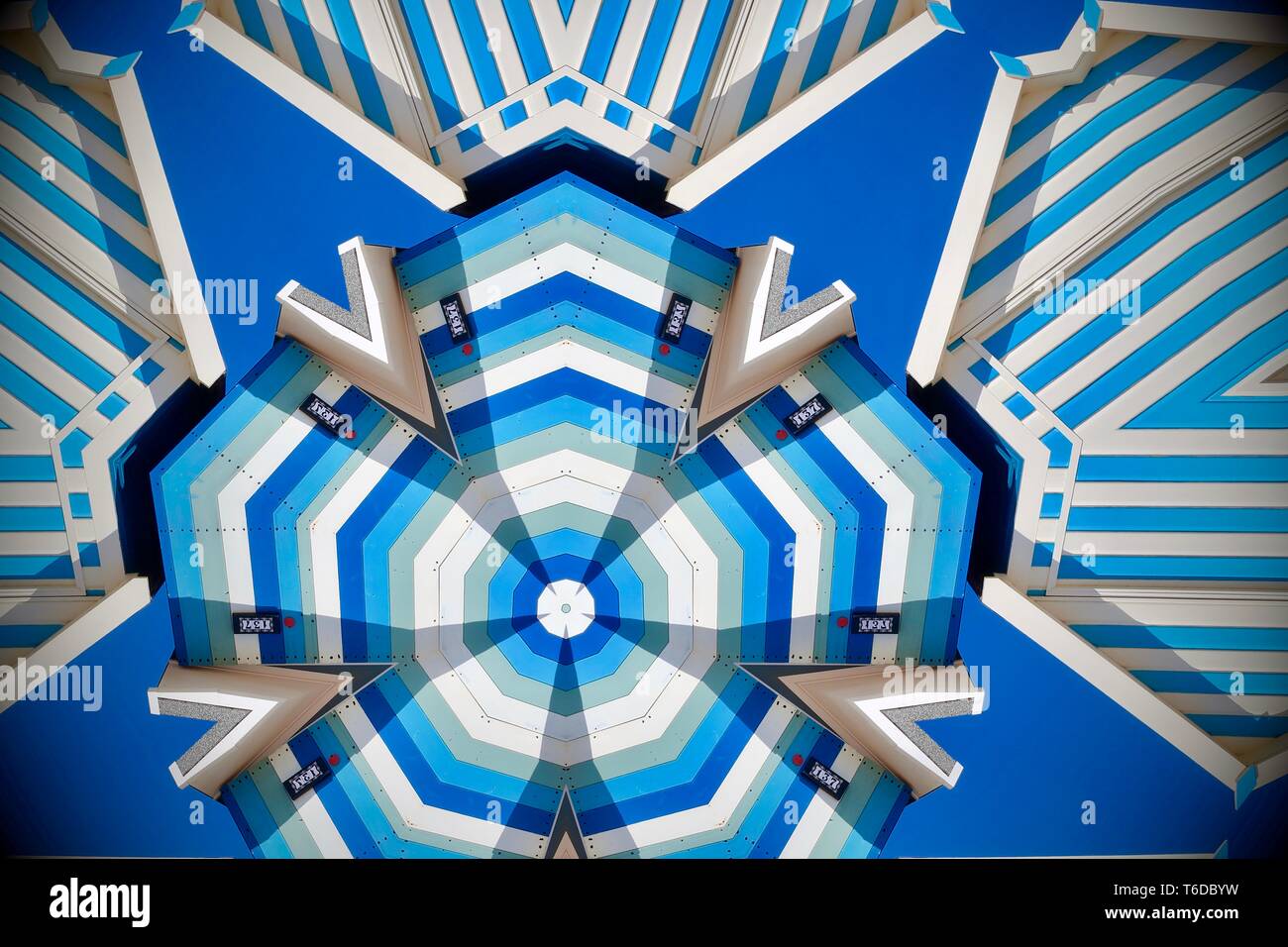 Abstract blue stripey beach hut image created using a kaleidoscope filter. Stock Photo