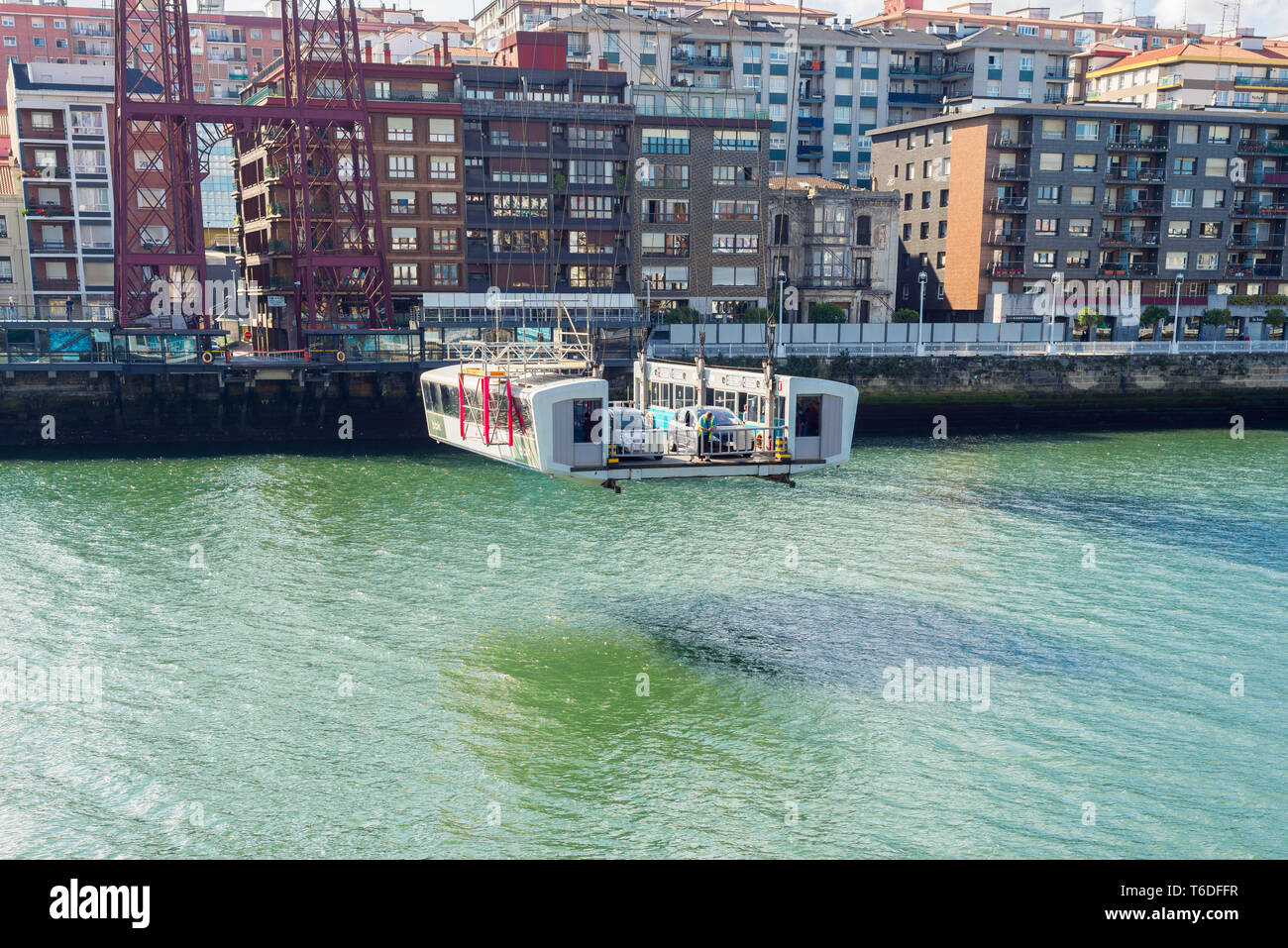 Shuttle hovers under the Vizcaya Bridge to Las Arenas Stock Photo