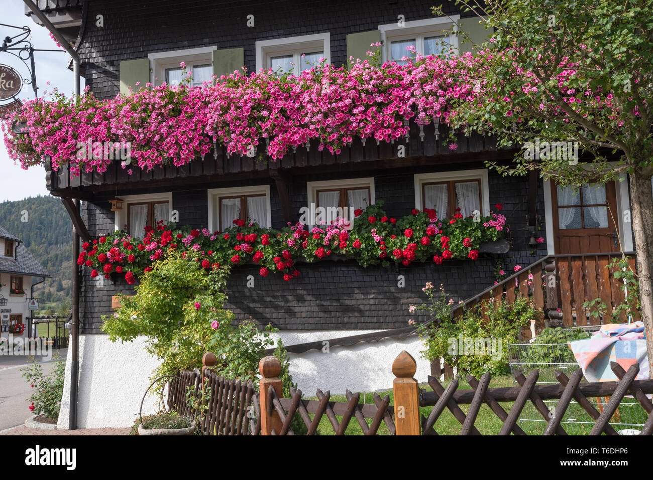 Black Forest house with typical flower decoration, Menzenschwand, Germany, High Black Forest near St. Blasien Stock Photo
