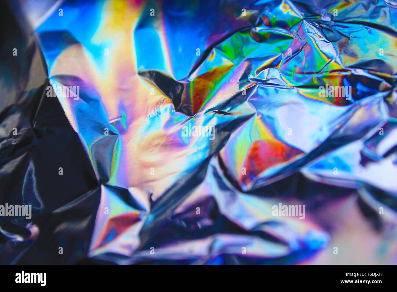 Holographic iridescent foil texture background. It can be used for posters,  cards, flyers, brochures, magazines and any kind of cover. eps 10 Stock  Photo - Alamy