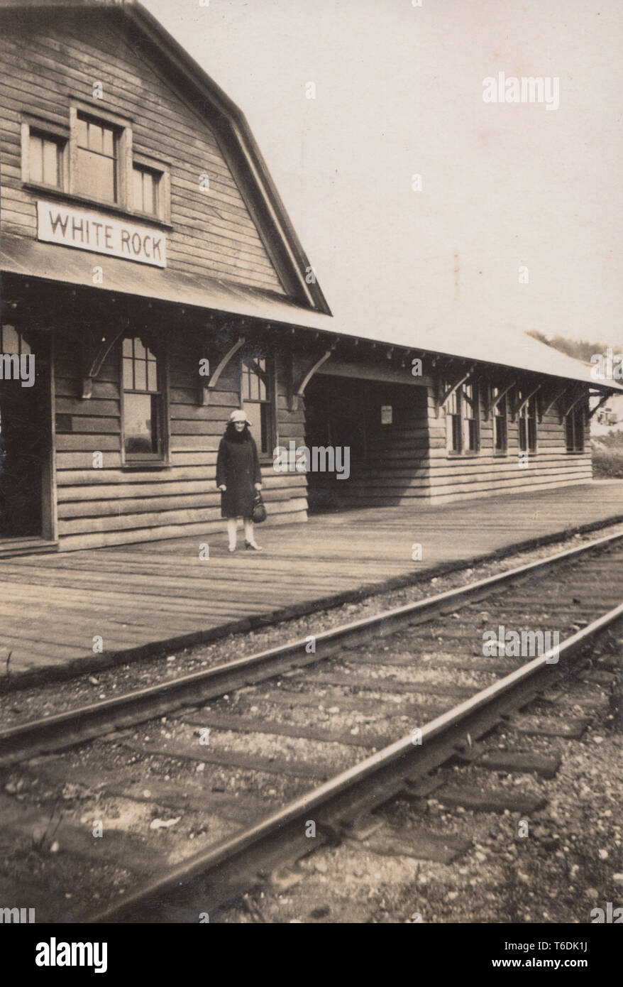 Lady Stood On The Platform of White Rock Train Station, British Columbia, Canada Stock Photo