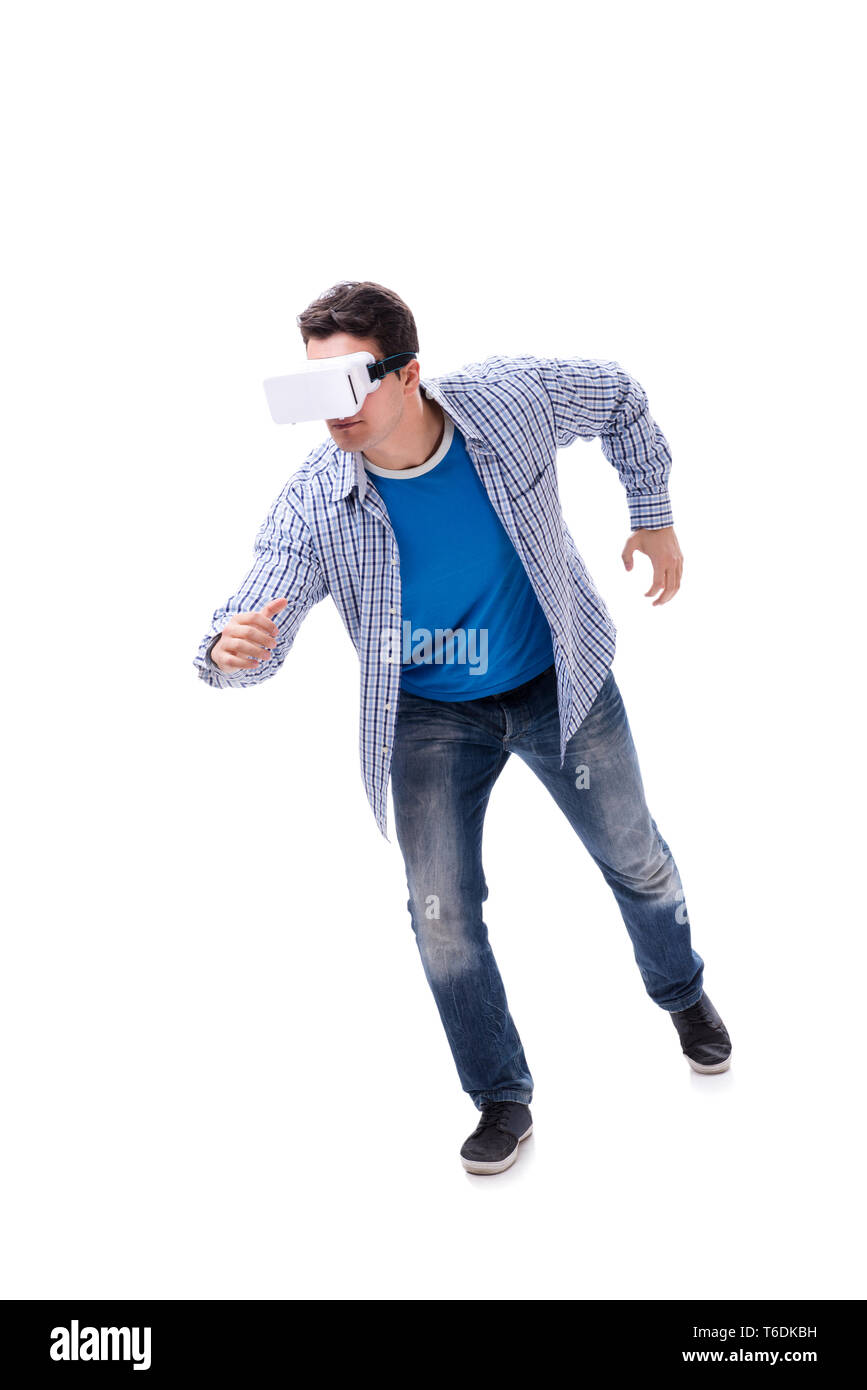 Young man wearing virtual reality VR glasses Stock Photo