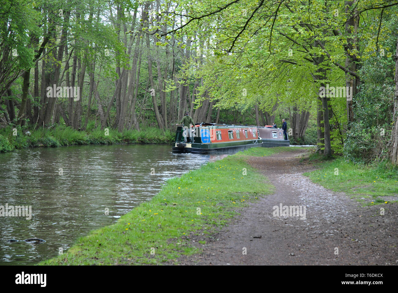 Two narrow boats passing on an English waterway Stock Photo