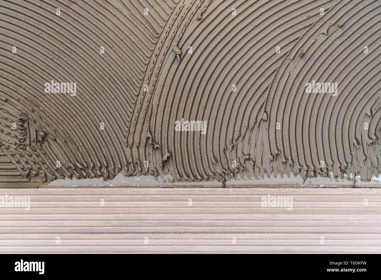 Ceramic Tiles Installation Process. Modern Building Technologies Stock