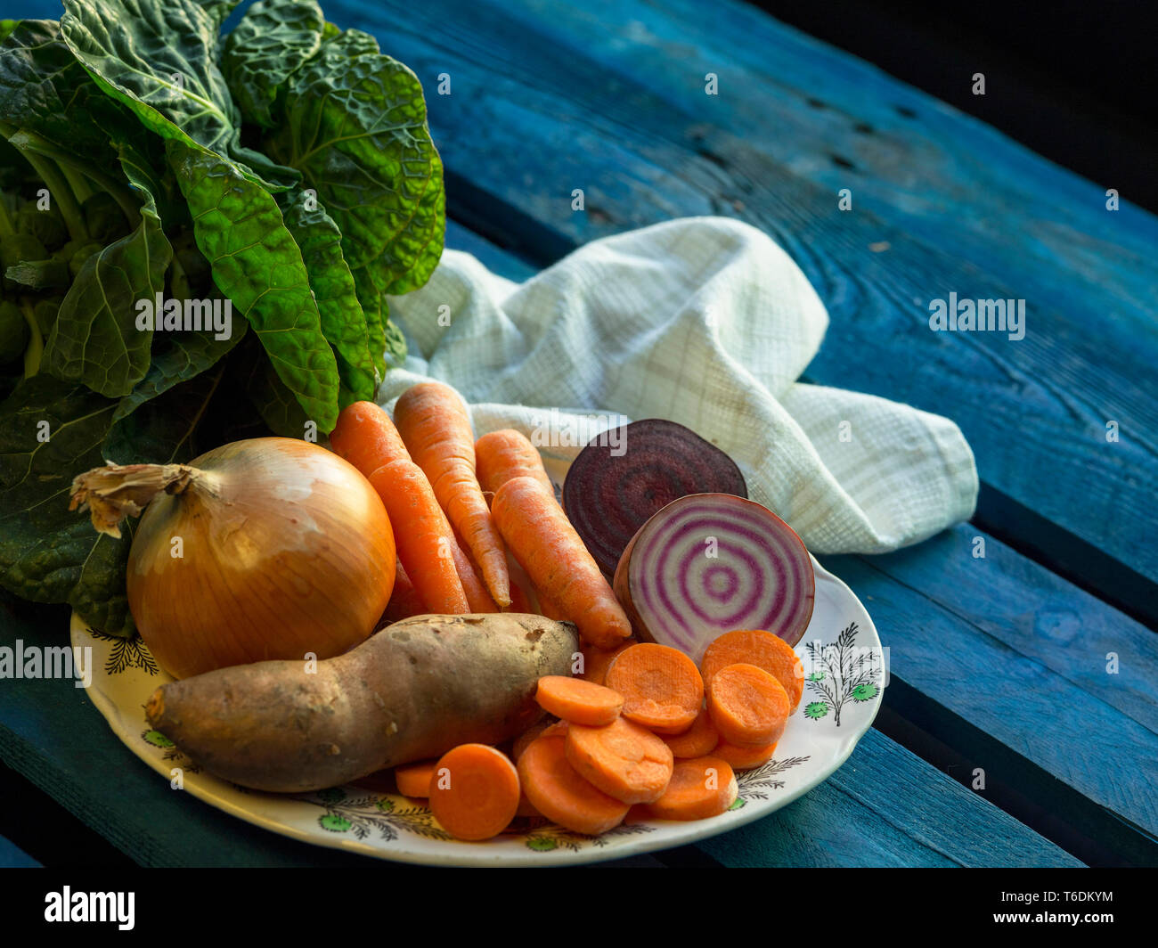 Root vegetables on plate on pallet hires stock photography and images