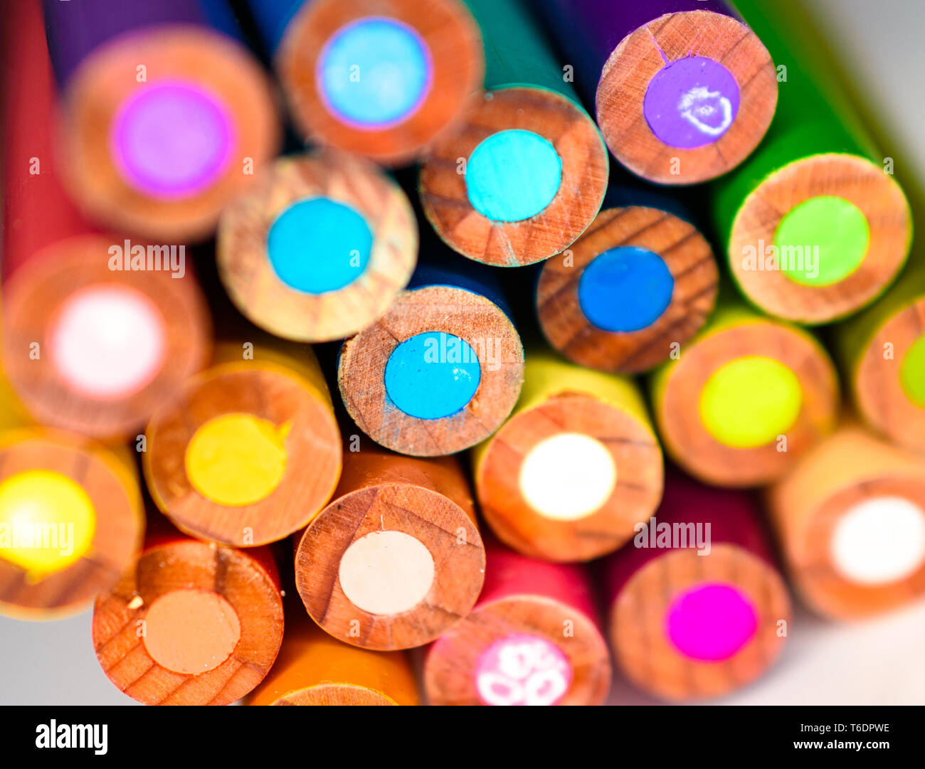 Shallow Closeup (Macro) View of Bright Wooden Colored  Pencil Ends in Tight Cluster Stock Photo
