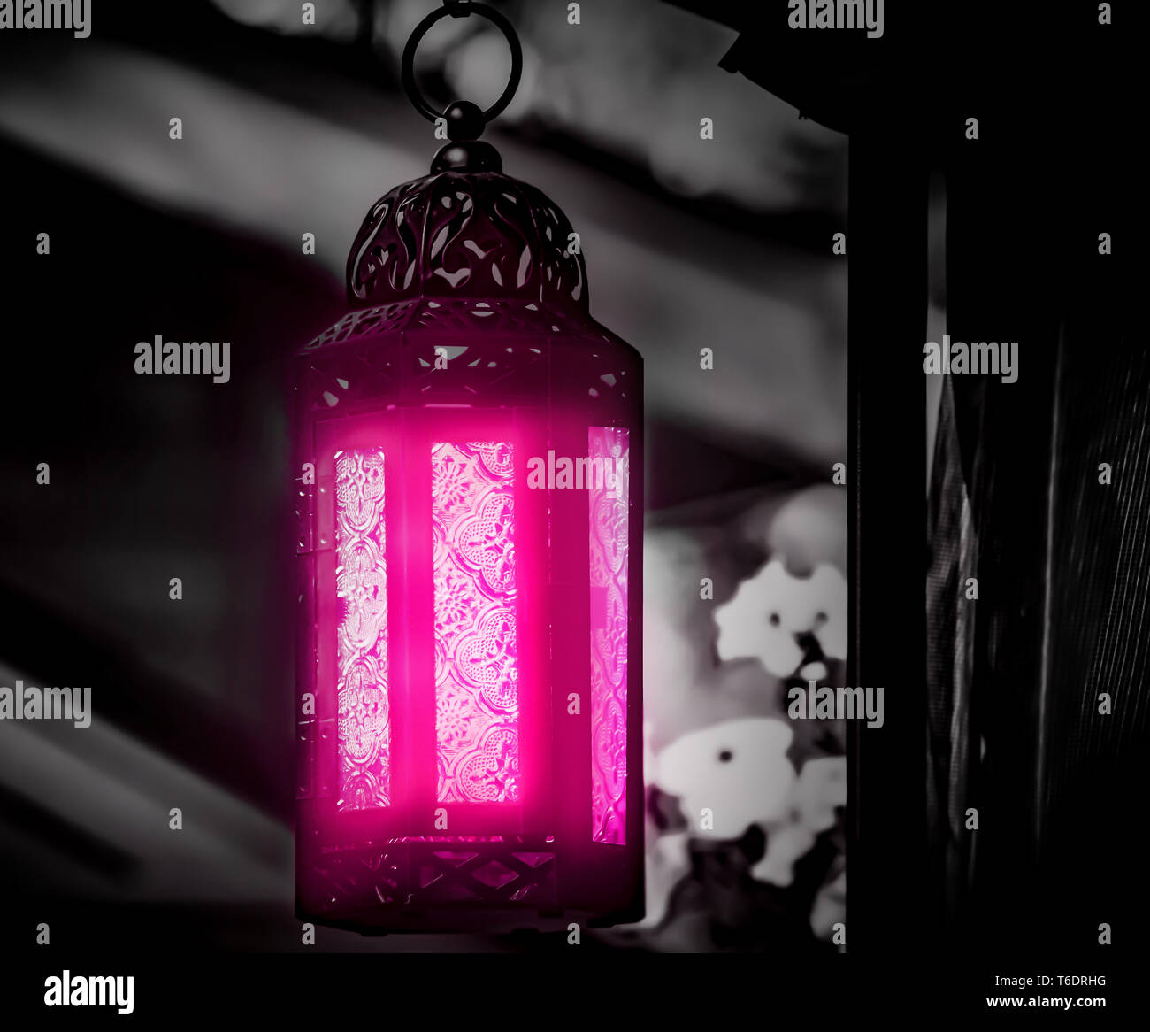 Stunning Moroccan Style Hanging Lantern Glowing Neon Pink (High Contrast Recolor) Stock Photo