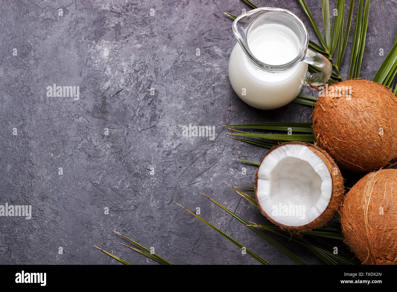 Coconut shell and milk Stock Photo