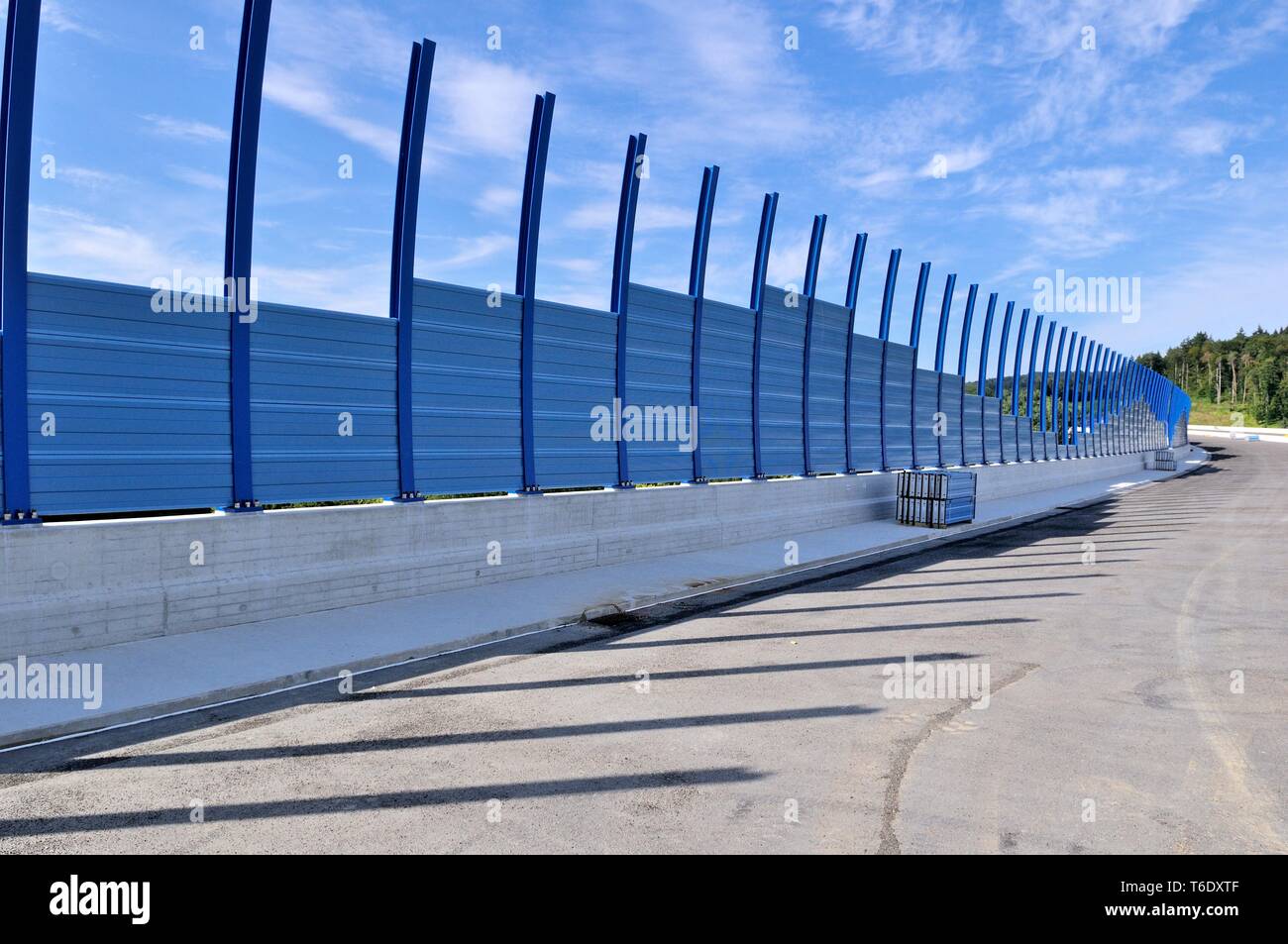 Noise barrier with metal elements under construction Stock Photo