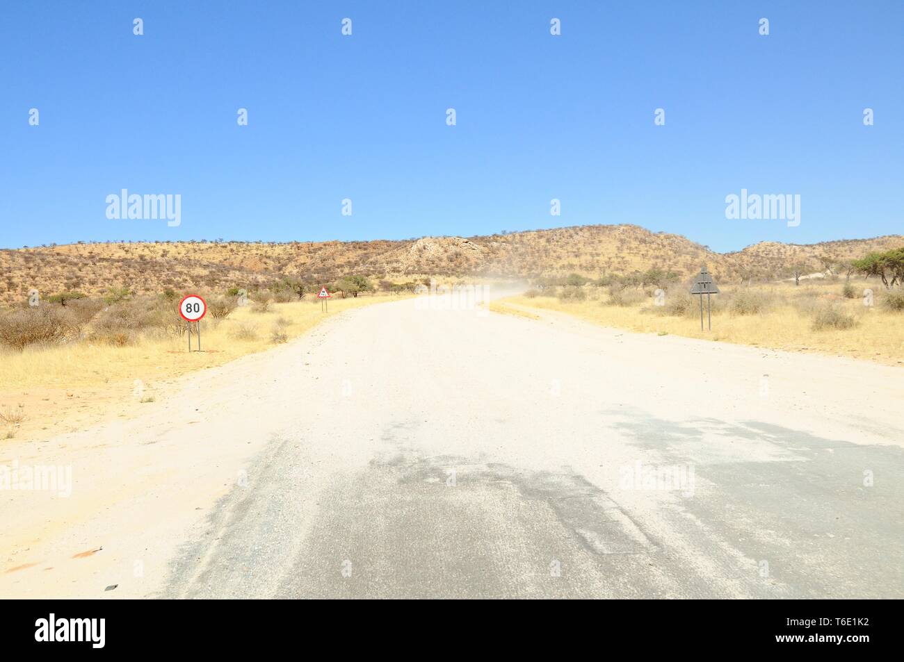 End of civilization - start of the gravel road Stock Photo