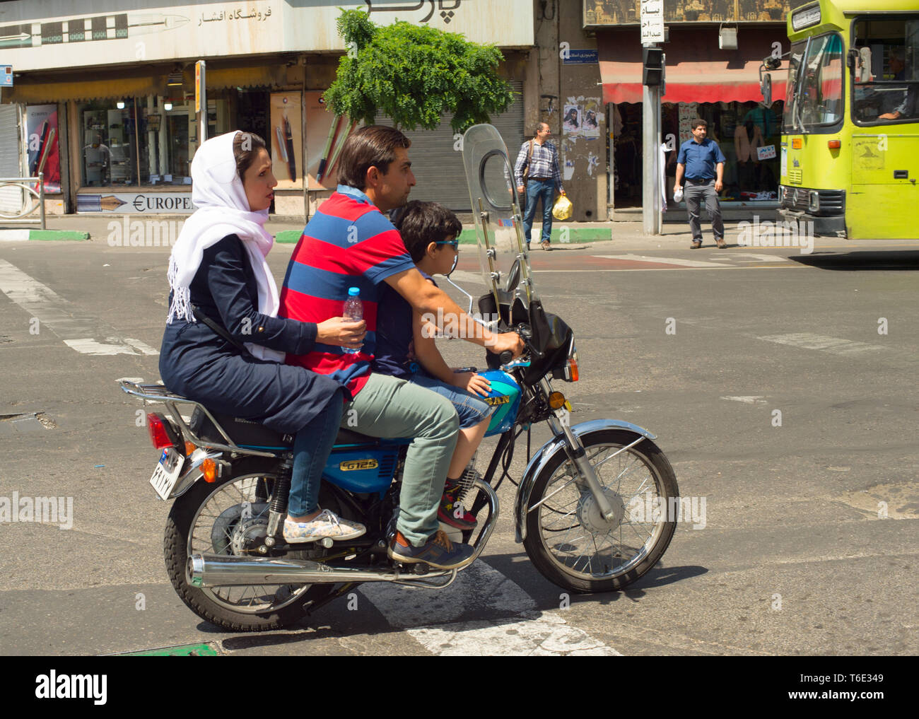 Family motorcycle Tehran road Iran Stock Photo - Alamy