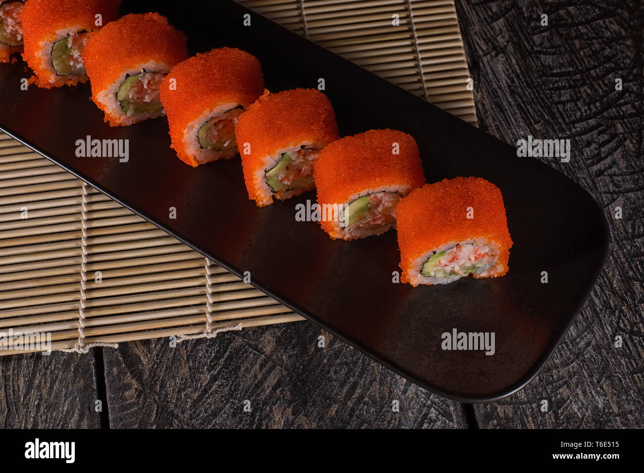 sushi closeup detail on black plate Stock Photo