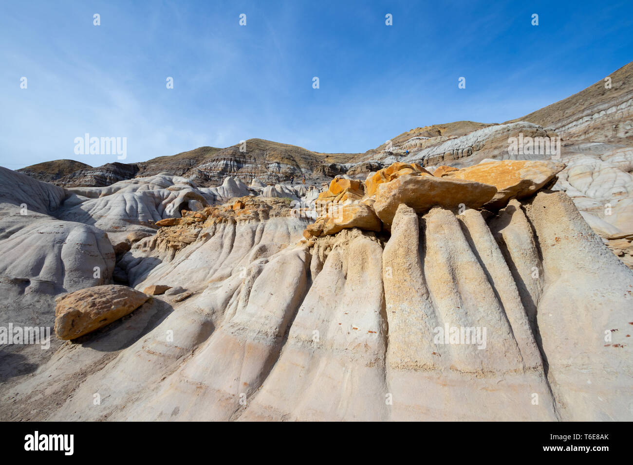 Drumheller HooDoos is a 0.5 kilometer heavily trafficked loop trail located near Drumheller, Alberta, Canada that features a cave, travel Alberta,Tour Stock Photo