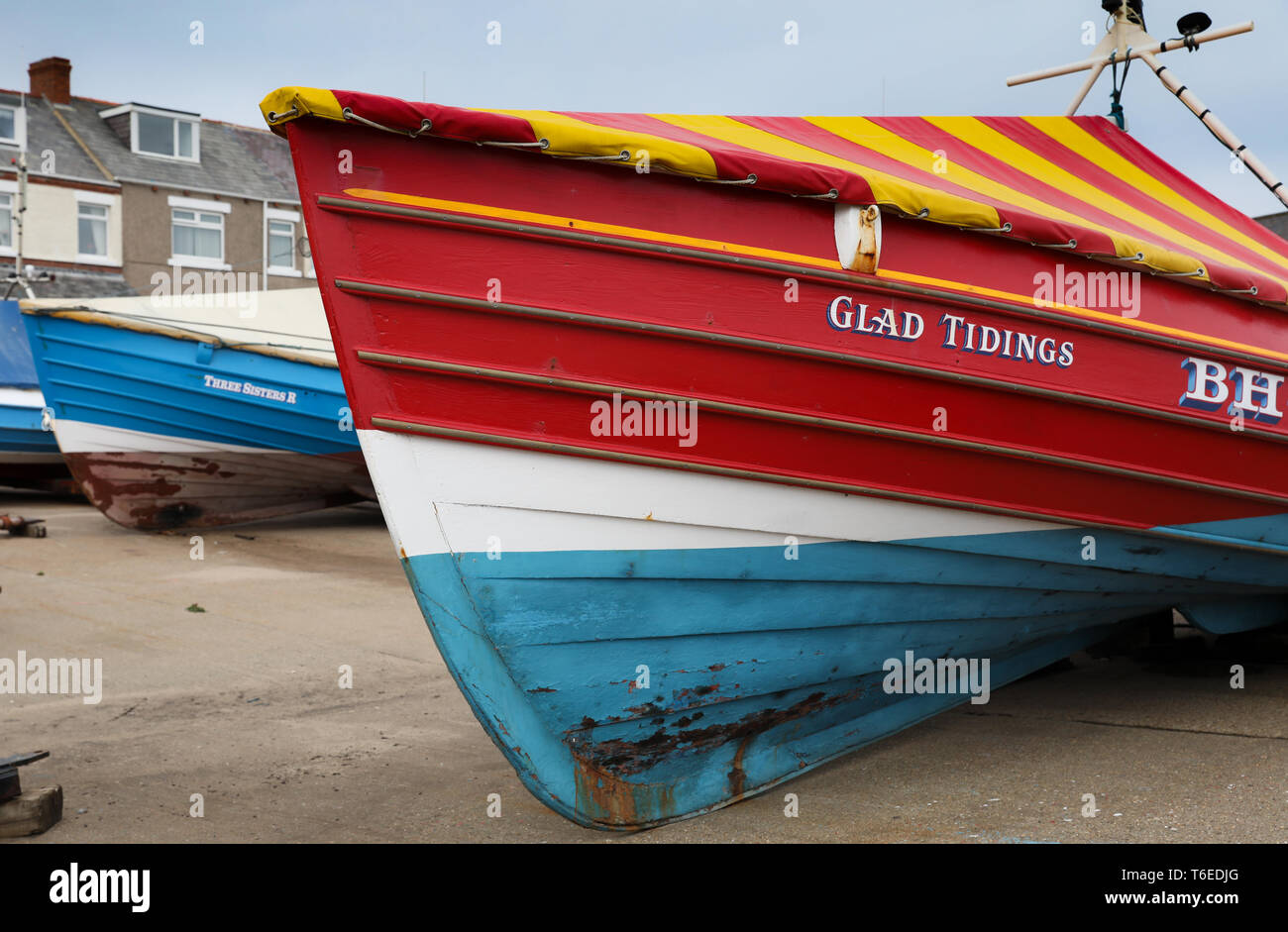 Traditional wooden coble fishing boat hi-res stock photography and ...