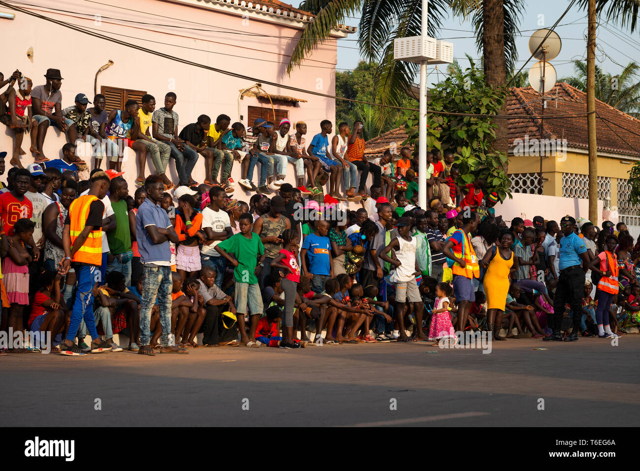 Bissau, Republic of Guinea-Bissau - February 12, 2018: Crowd watching the Carnival Celebrations in the city of Bisssau. Stock Photo