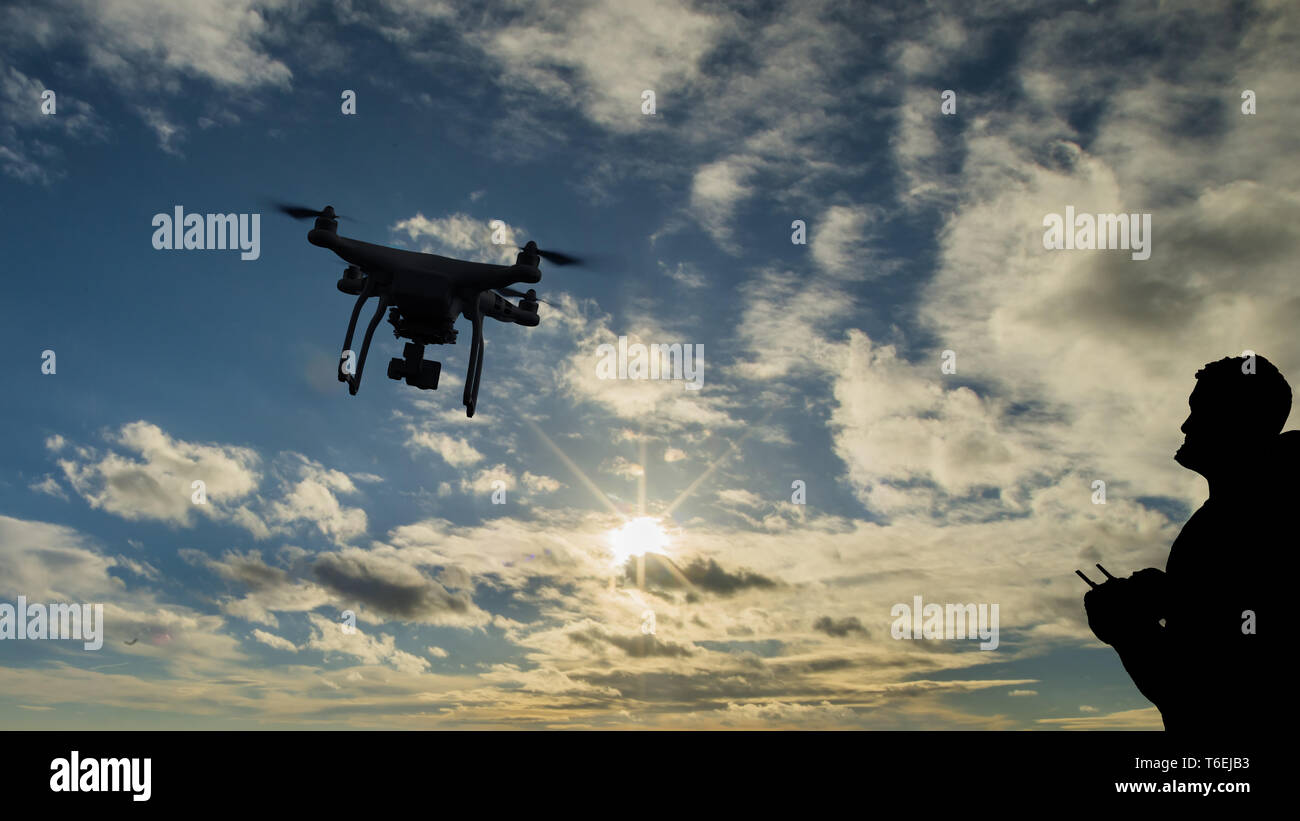 man playing with a multicopter Stock Photo