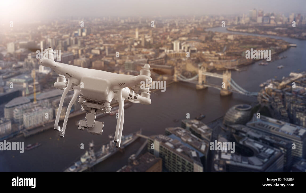 Drone flying over cityscape of London Stock Photo