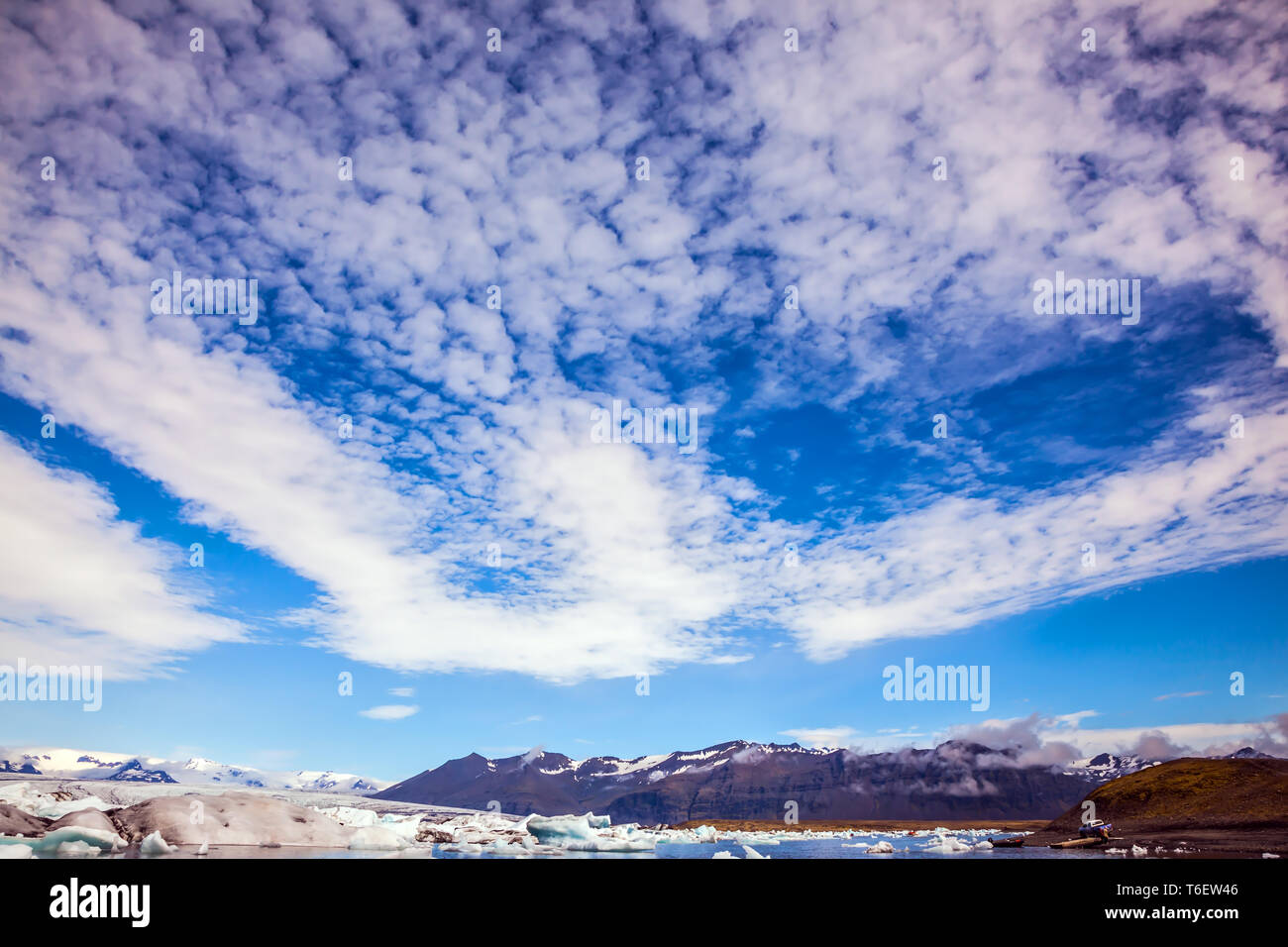 The icebergs and cirrocumulus clouds Stock Photo