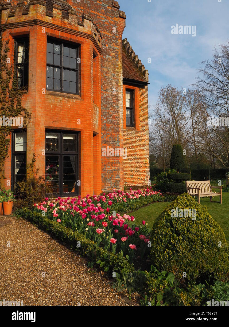 Chenies Manor House and Gardens in April showing colourful tulip