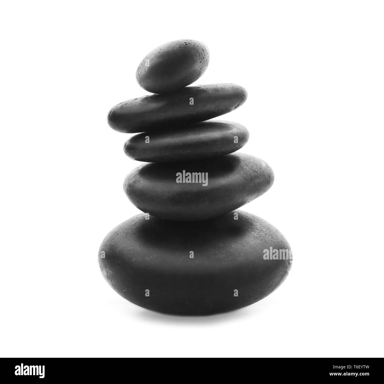 Stack of spa stones on white background Stock Photo - Alamy