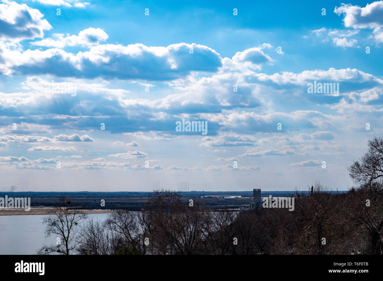 The spring Park is illuminated by the bright sun. View of a large and ...