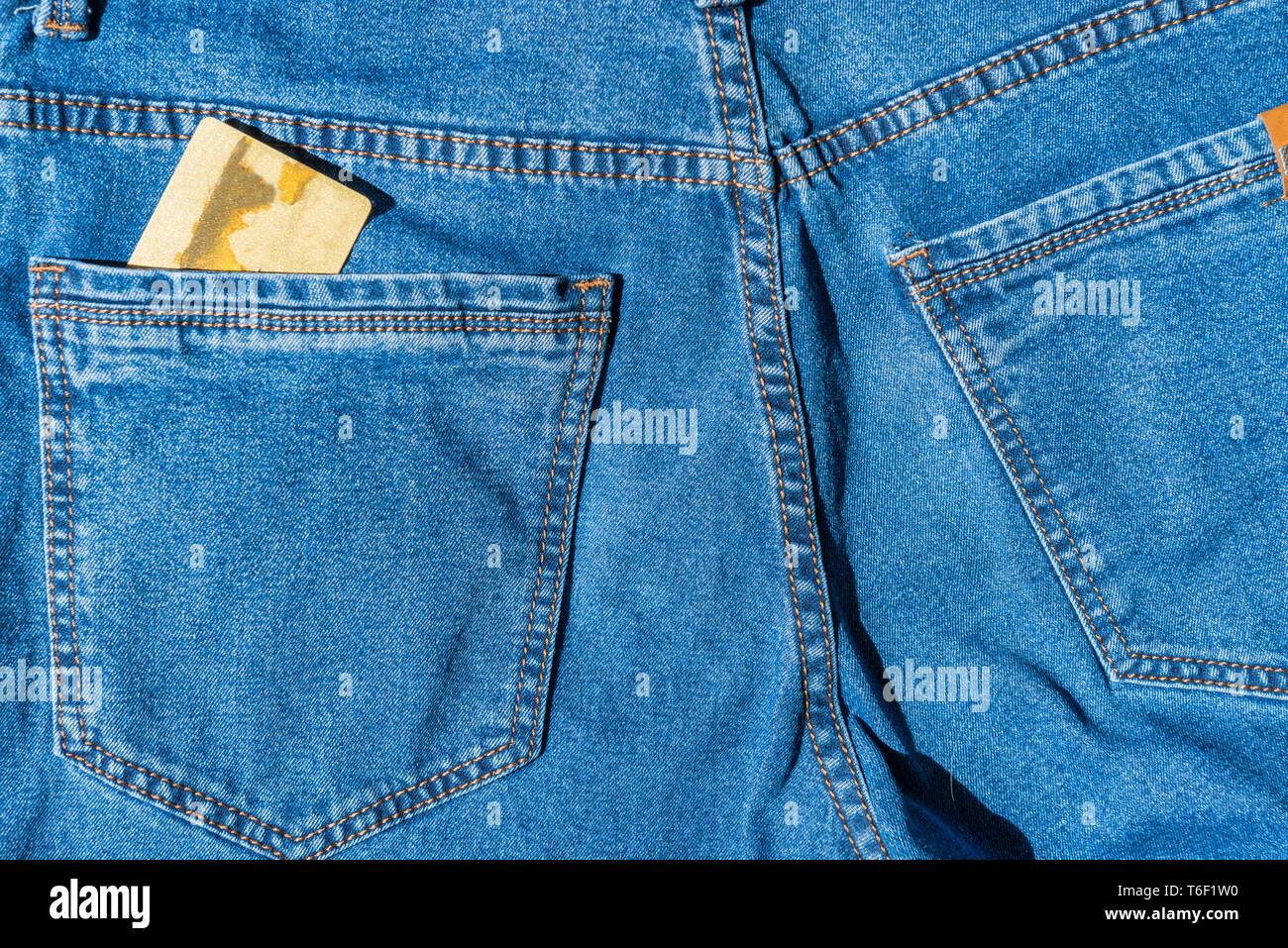Credit plastic bank card in blue jeans pocket Stock Photo - Alamy