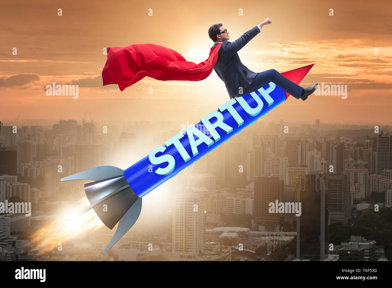 Superhero businessman in start-up concept flying rocket Stock Photo - Alamy