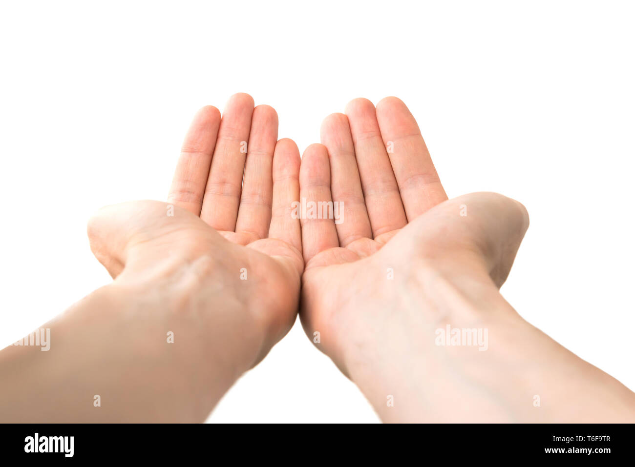 Two open hands giving something Stock Photo