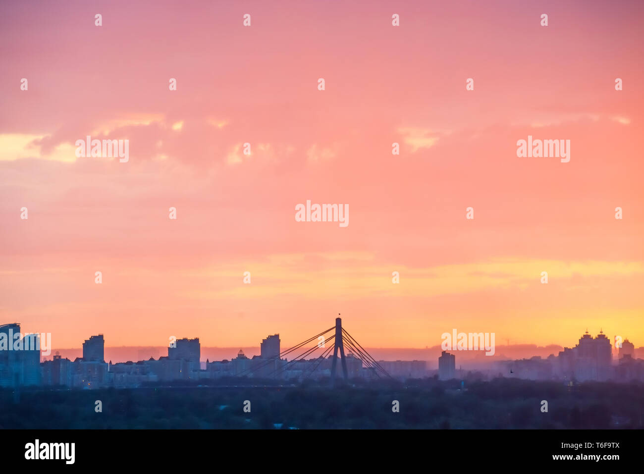 Modern cityscape against sunset Stock Photo