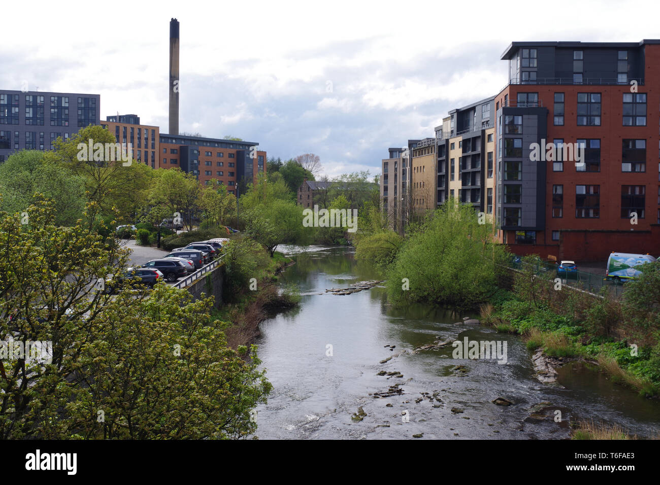 The River Kelvin in Partick. Modern flats on the right which used to be