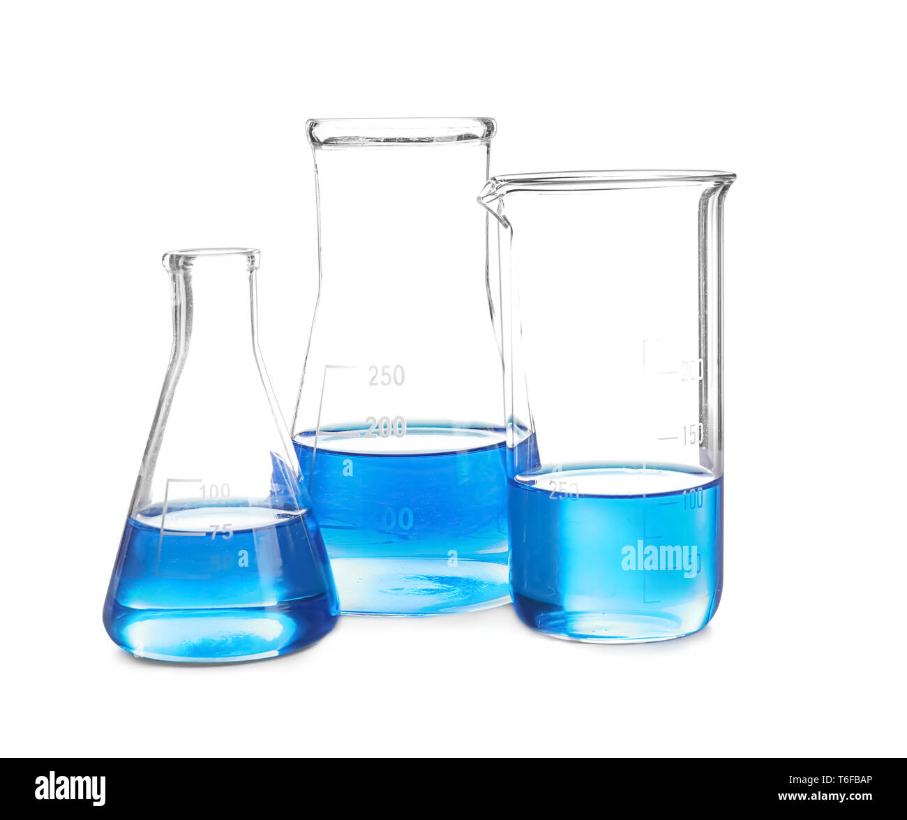 Laboratory glassware with blue liquid on white background Stock Photo ...