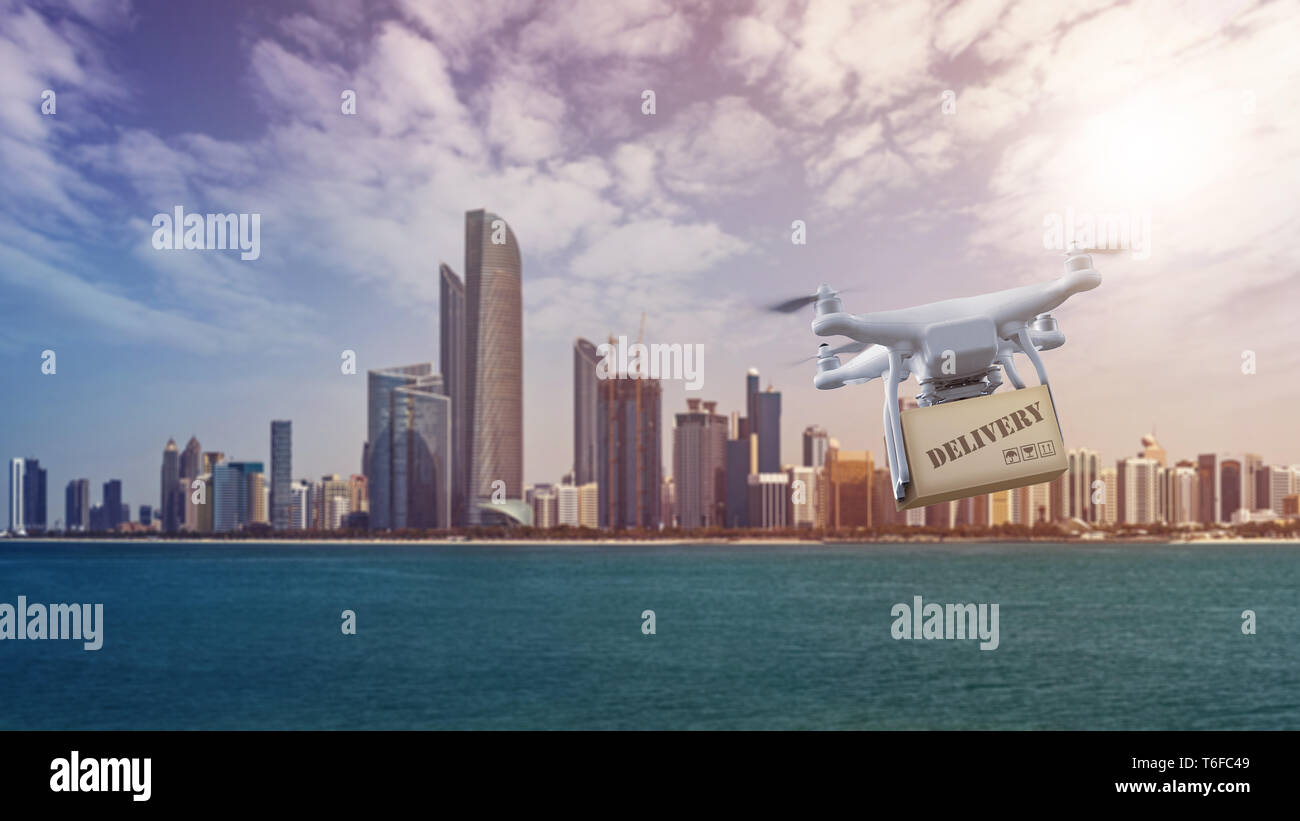 Drone with package flying in front of Abu Dhabi Skyline Stock Photo