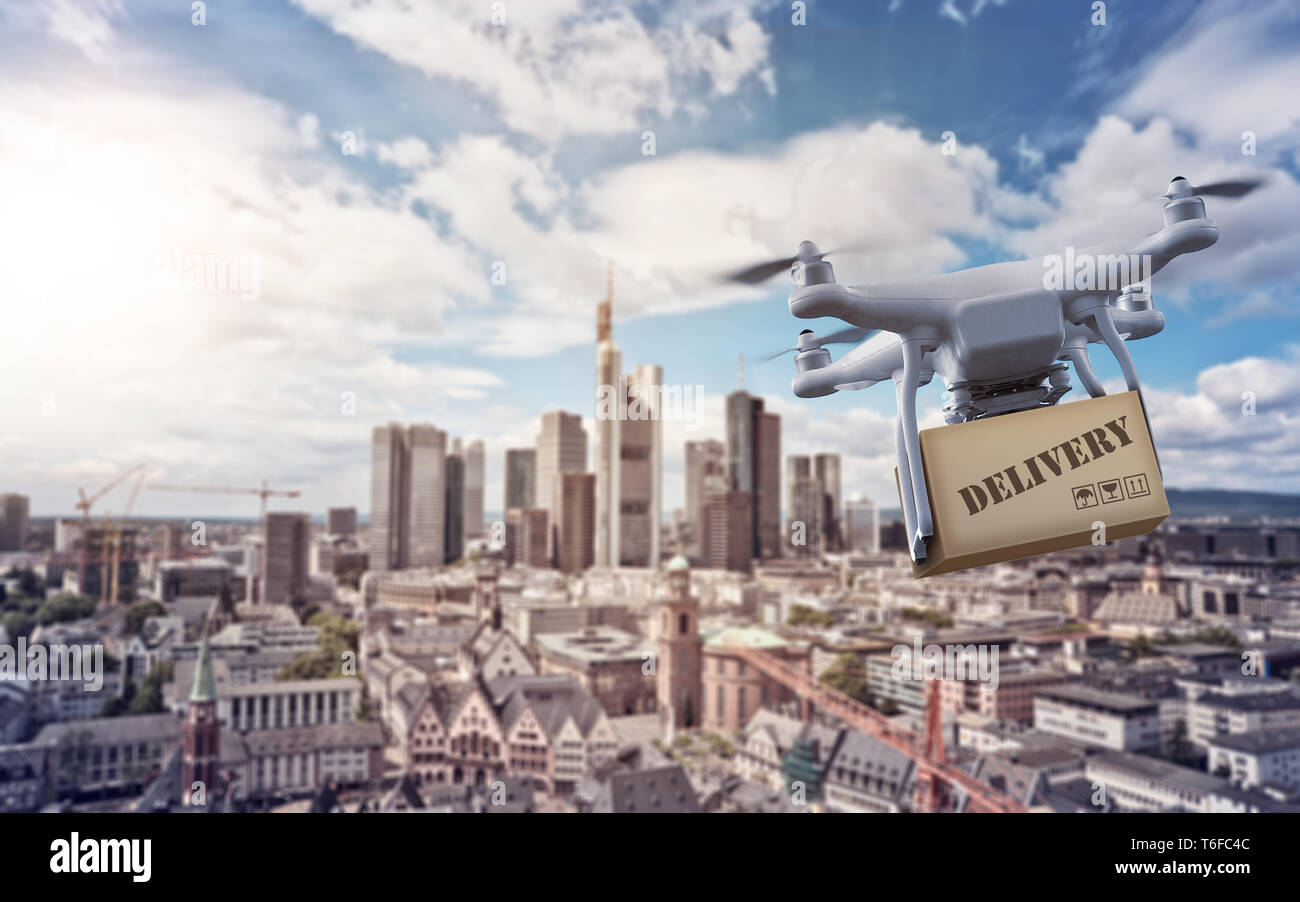 Drone with package over Frankurt Skyline Stock Photo