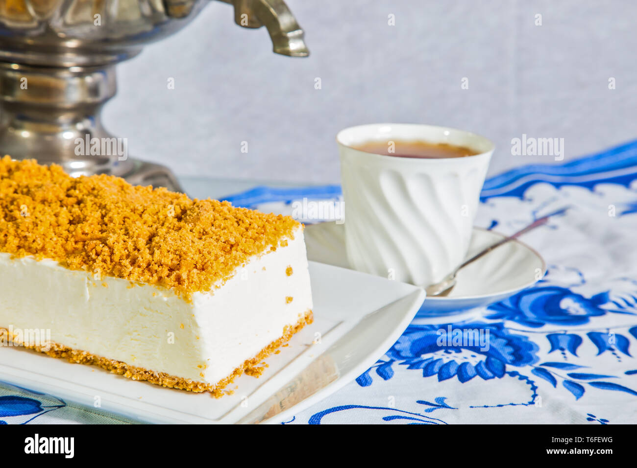 Exquisite cheesecake with orange crumbs Stock Photo