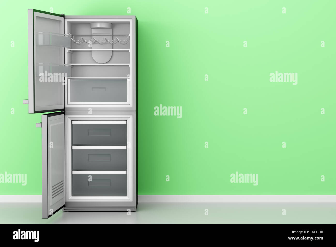 open empty fridge in front of green wall Stock Photo