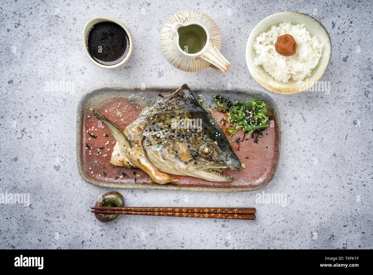 Traditional Barbecue Japanese Kama Yaki Broiled Salmon Fish Head With Rice And Umeboshi As Close Up On A Plate Pro09011 Stock Photo Alamy