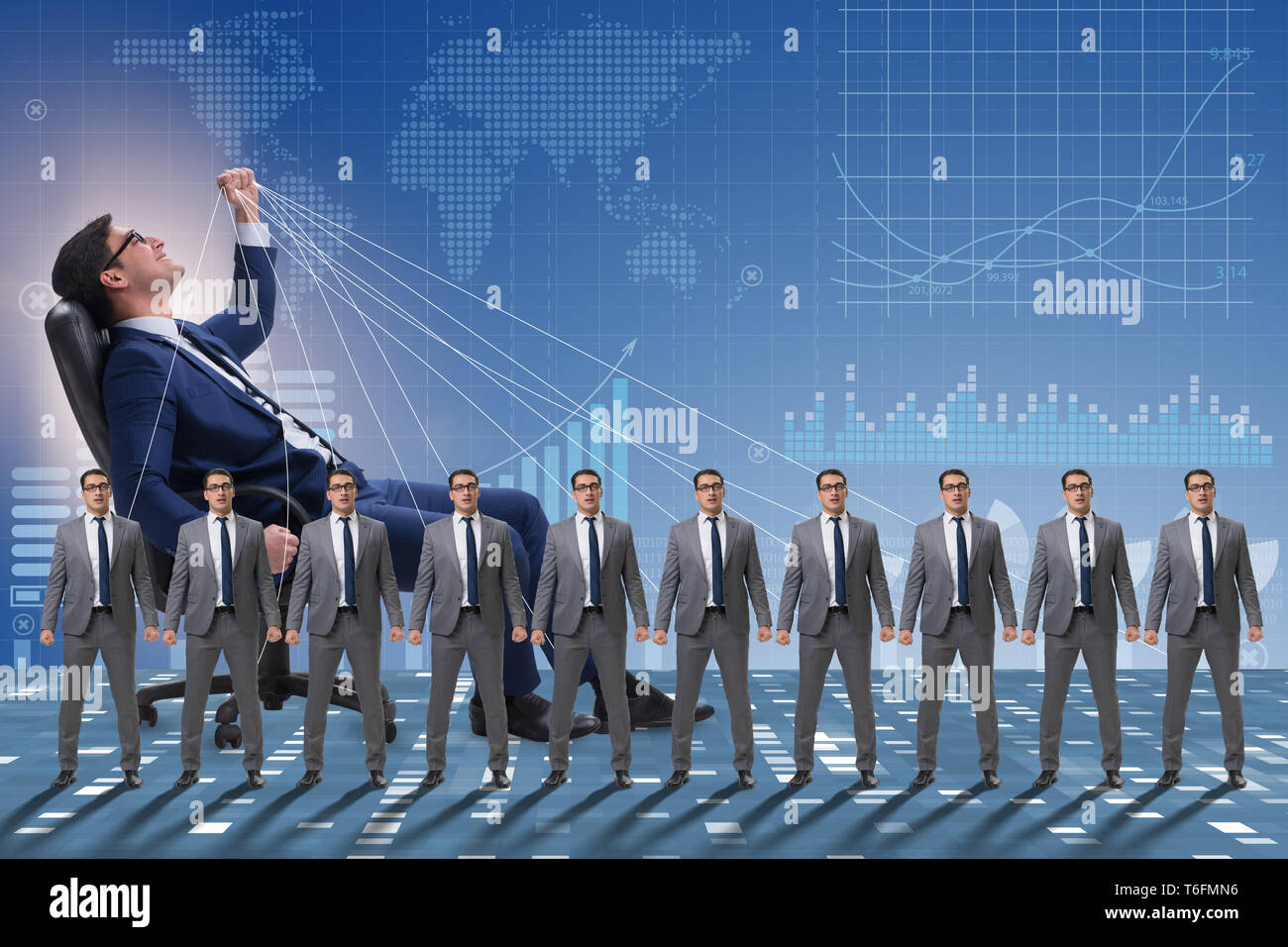 Boss employee manipulating his staff in business concept Stock Photo ...