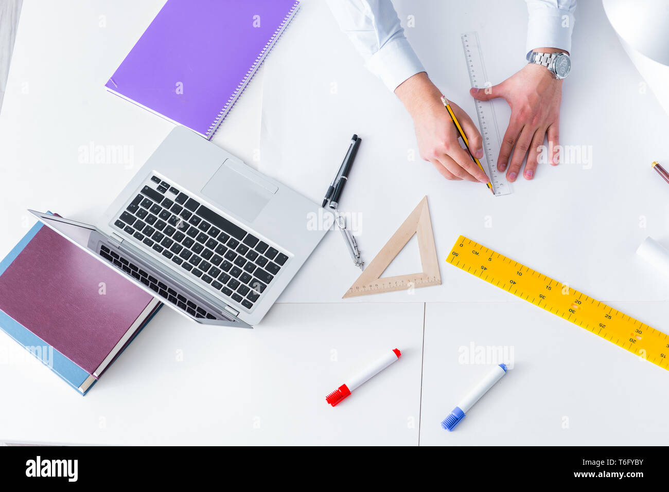 Workign Drawing Engineering Engineer working on new project drawings Stock Photo - Alamy