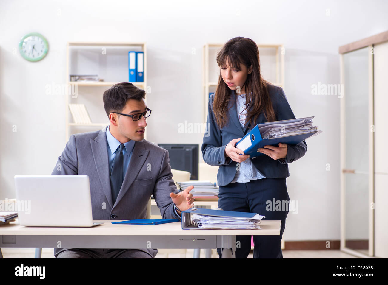 Man and woman working in the office Stock Photo - Alamy