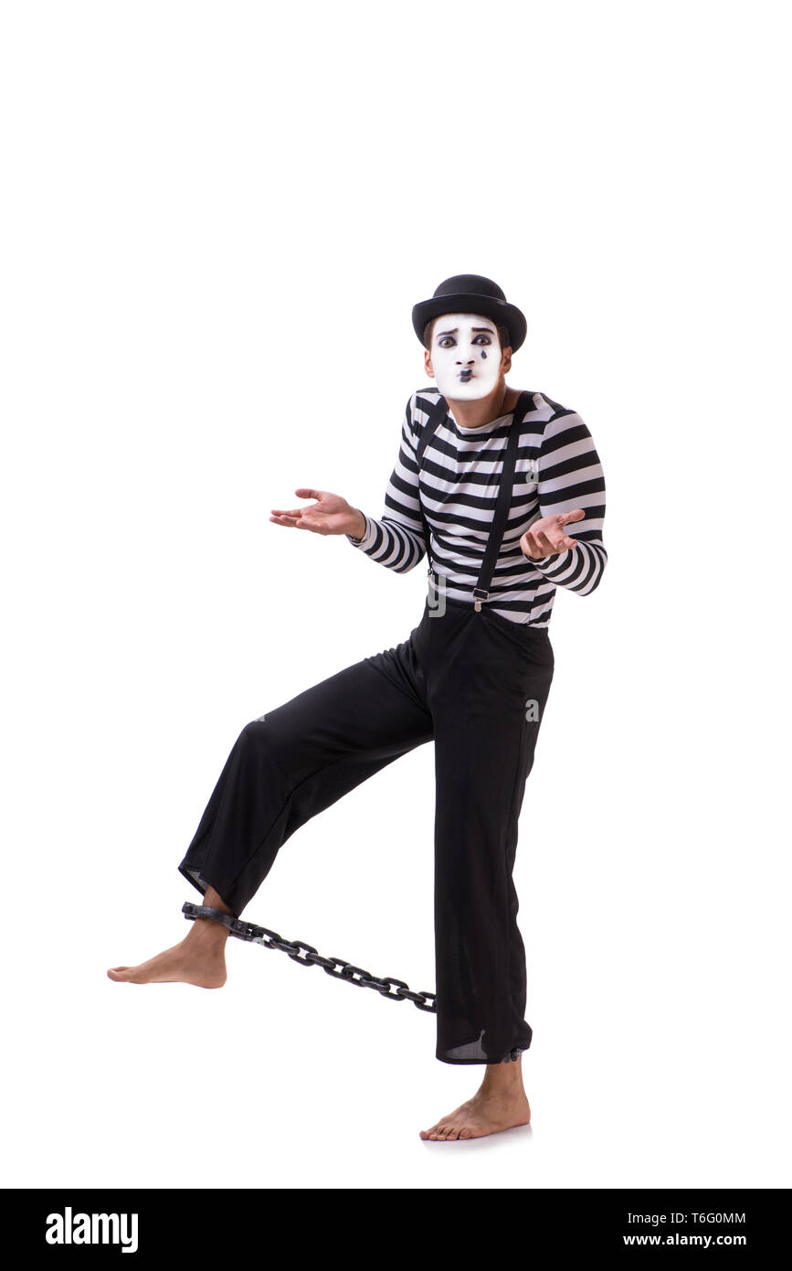 Mime with his feet chained isolated on white Stock Photo Alamy