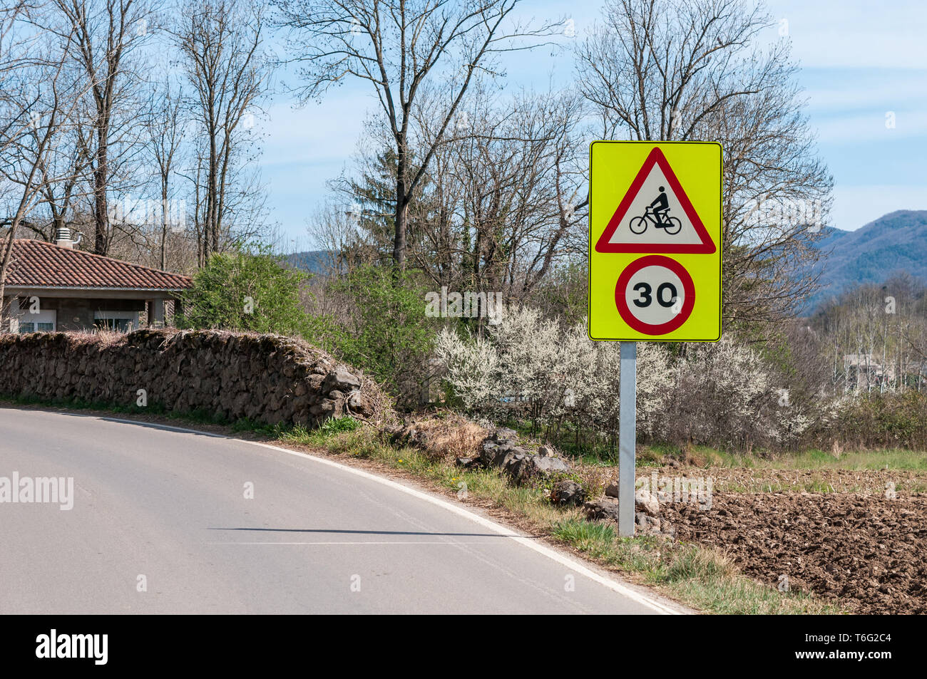 traffic signals, danger cylist and maximum speed 30 km/h, Catalonia, Spain Stock Photo