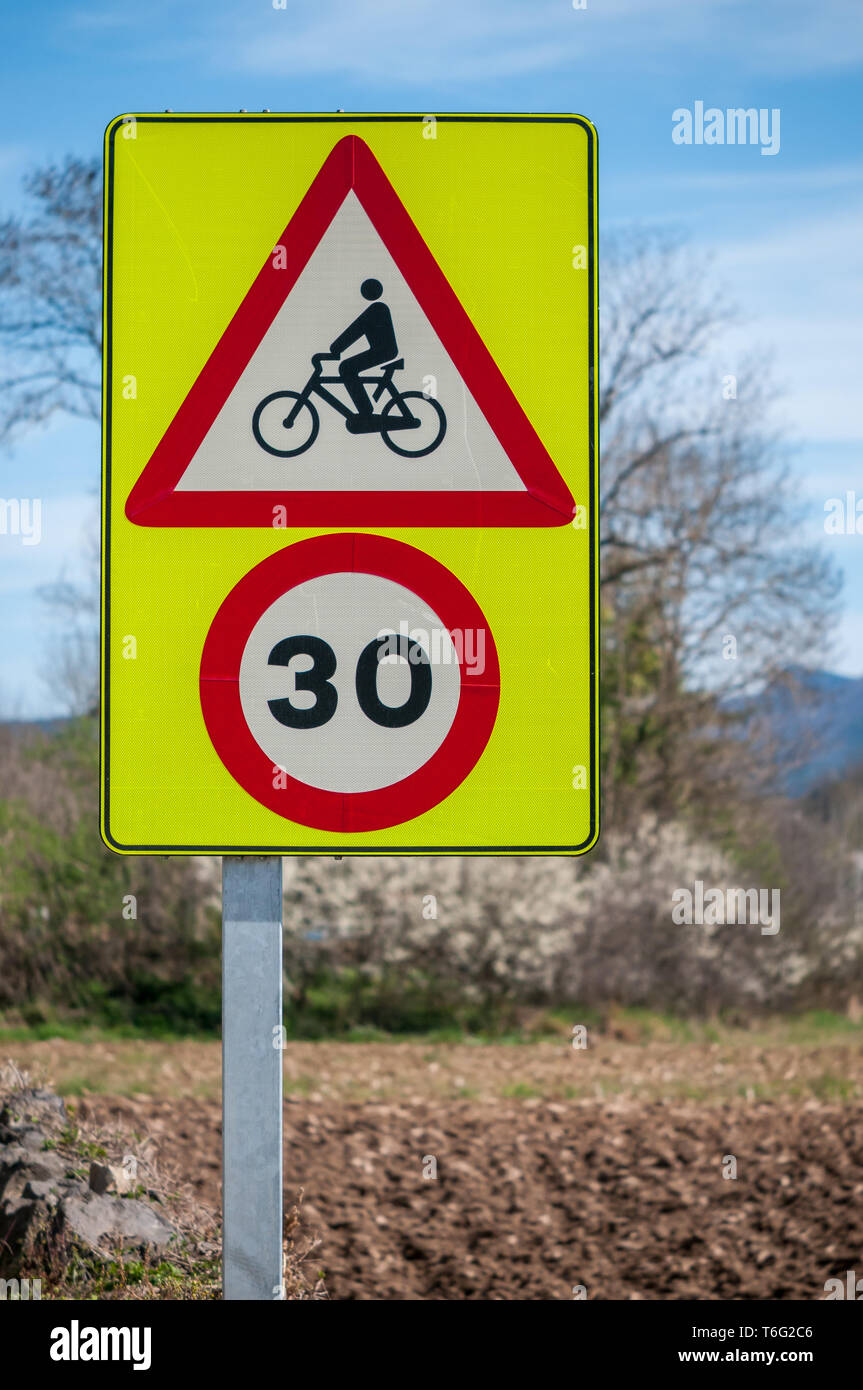 traffic signals, danger cylist and maximum speed 30 km/h, catalonia, Spain Stock Photo