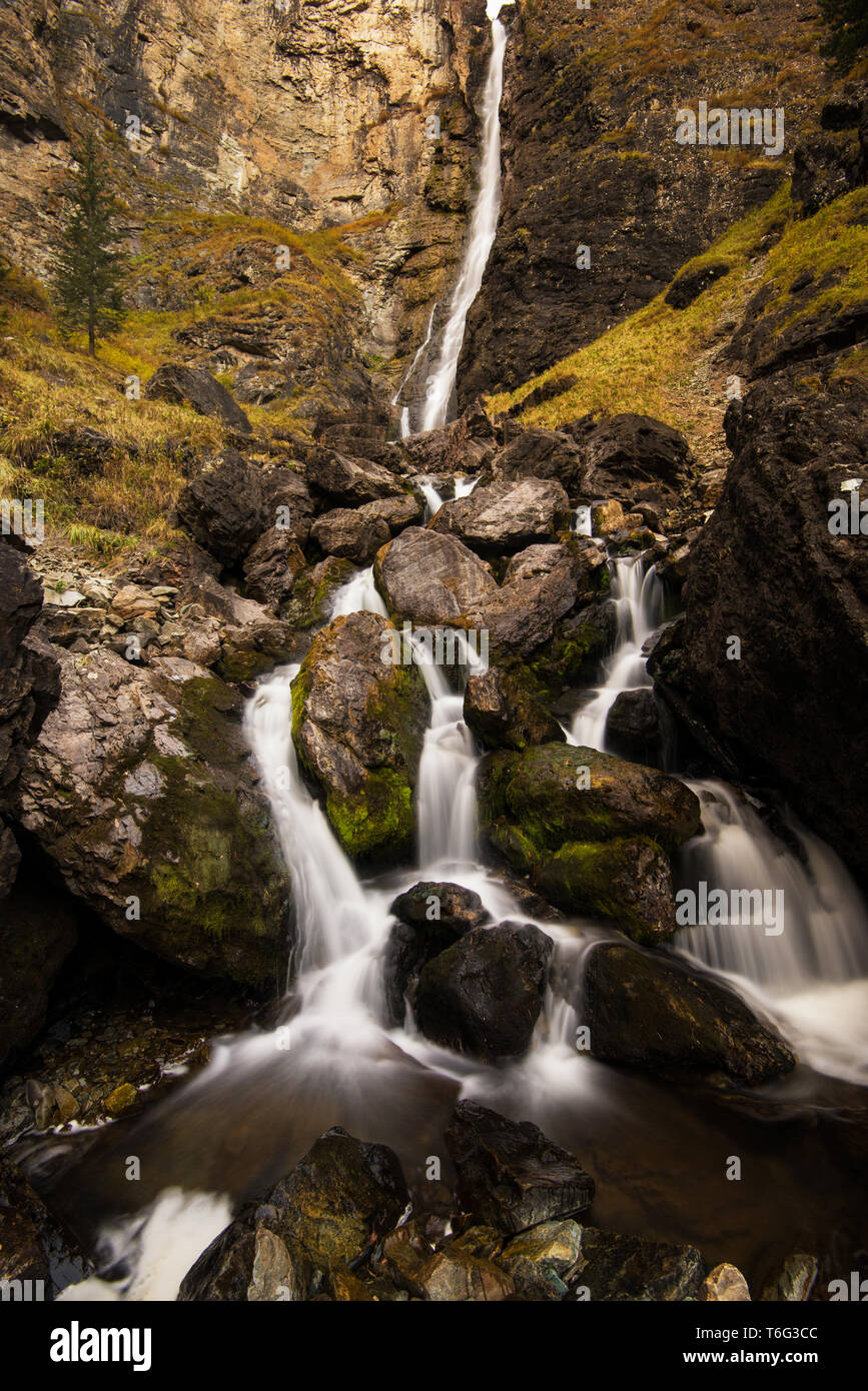 Putorana Plateau, a waterfall on the Grayling Stream. Mountain stream on a  cloudy day Stock Photo - Alamy