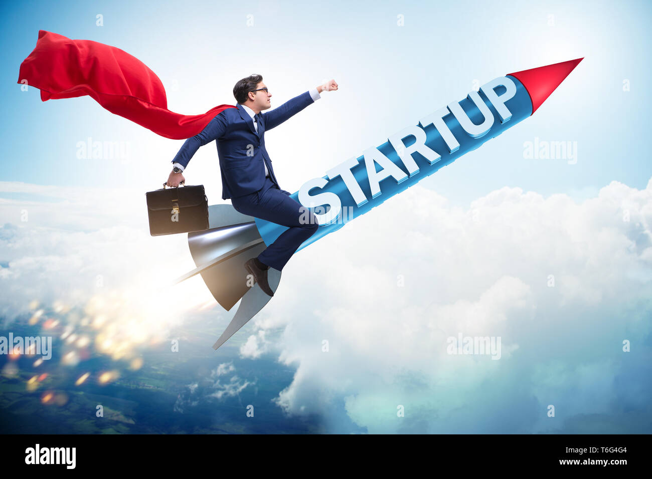 Superhero businessman in start-up concept flying rocket Stock Photo - Alamy