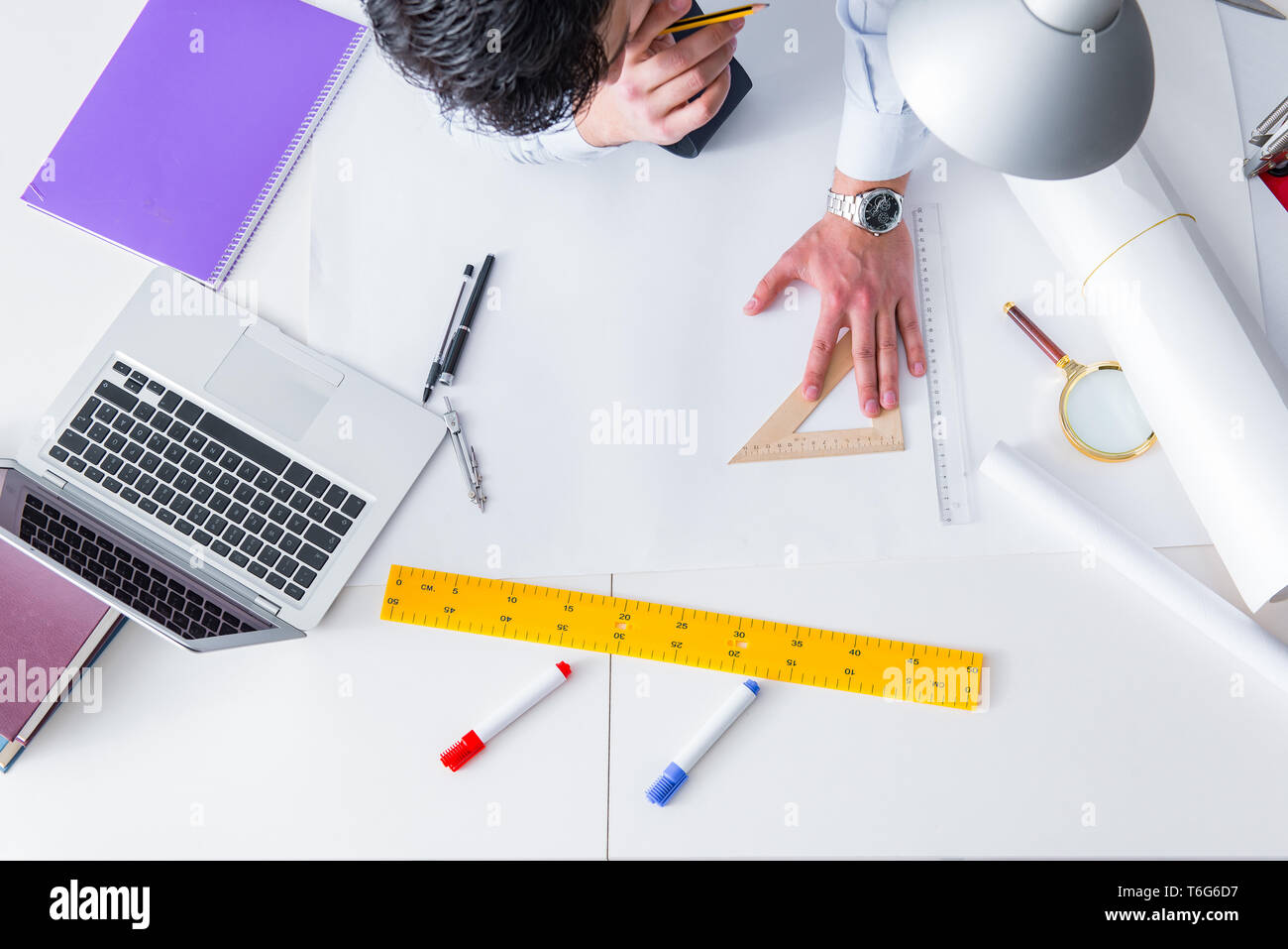 Workign Drawing Engineering Engineer working on new project drawings Stock Photo - Alamy
