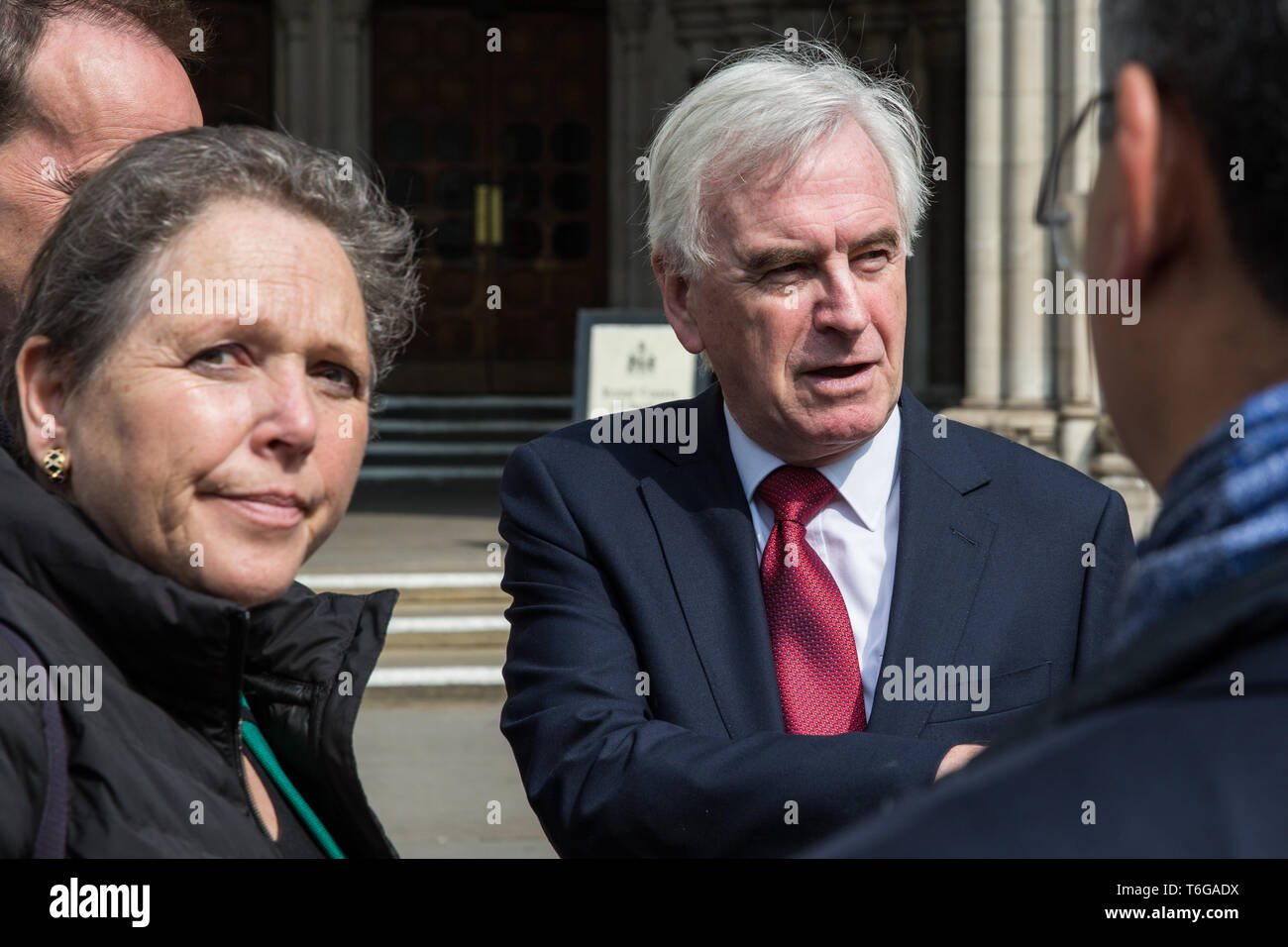 London, UK. 1st May, 2019. Shadow Chancellor John McDonnell, also Labour MP for Hayes and Harlington, speaks to campaigners outside the Royal Courts of Justice after the failure of a High Court challenge to the controversial plans to build a third runway at Heathrow airport. Judicial reviews of the Government's decision to approve the plans had been brought by five councils, residents, environmental charities including Greenpeace, Friends of the Earth and Plan B and London Mayor Sadiq Khan. Credit: Mark Kerrison/Alamy Live News Stock Photo